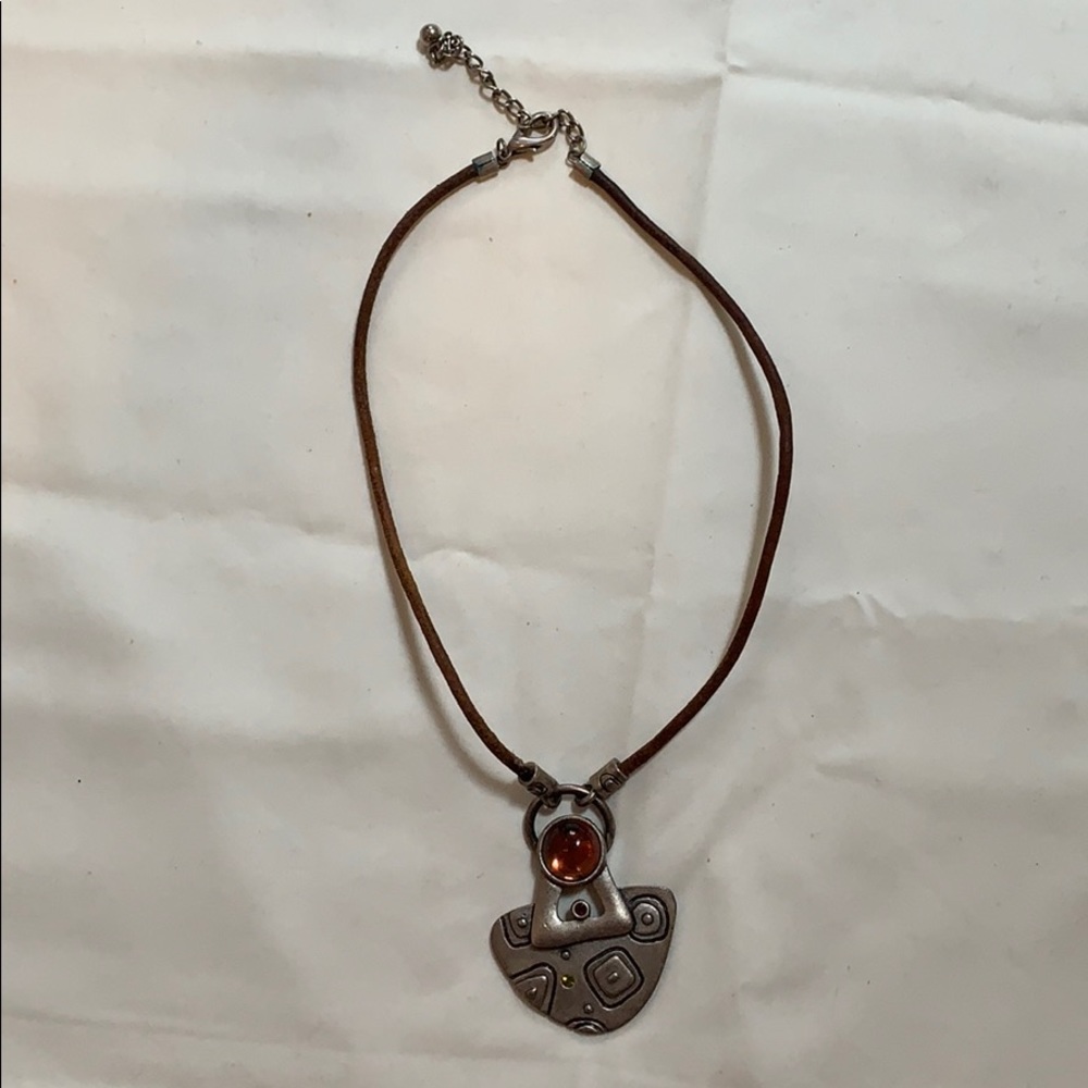 Silver necklace on leather string